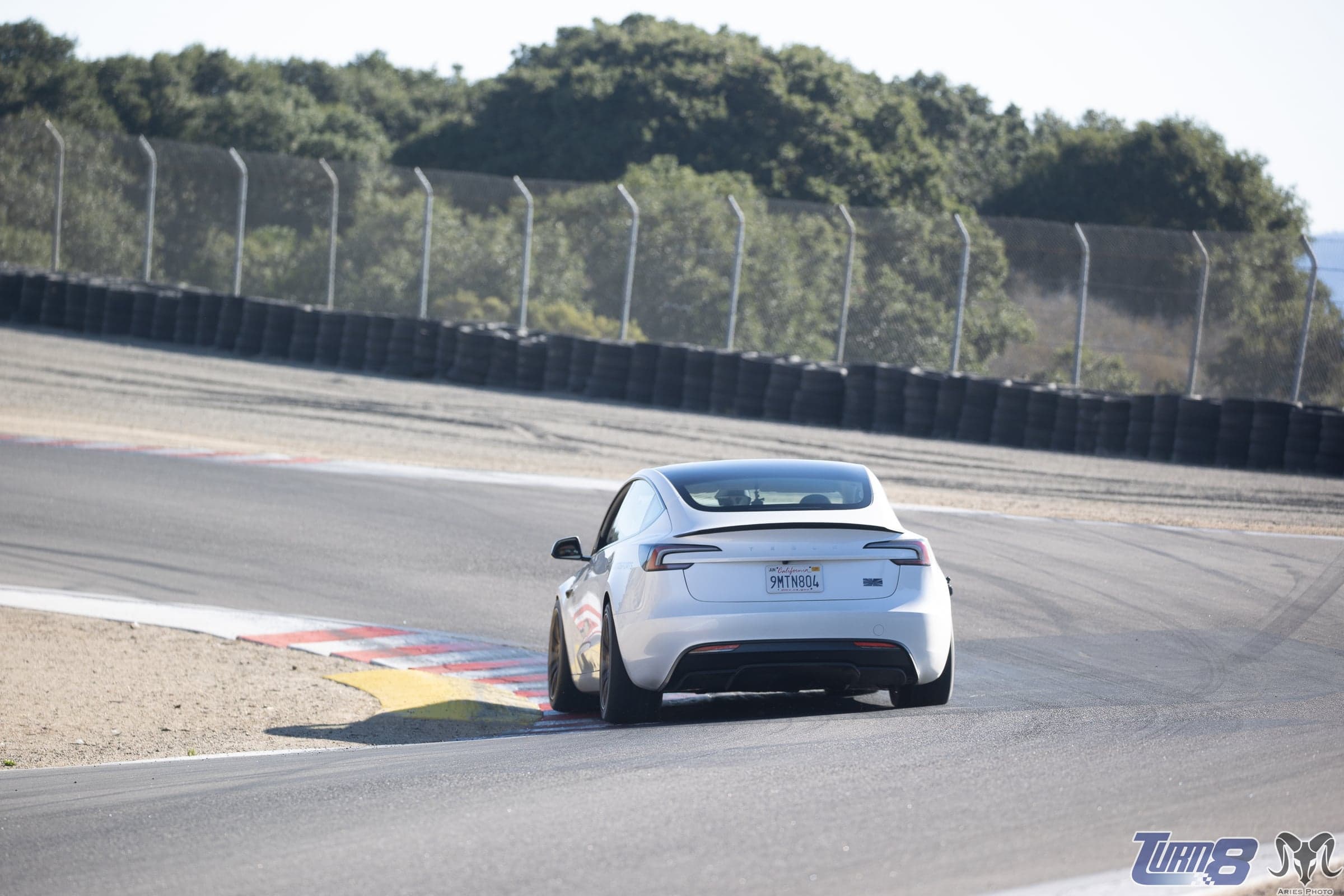 Model 3 Performance exiting a corner at Laguna Seca